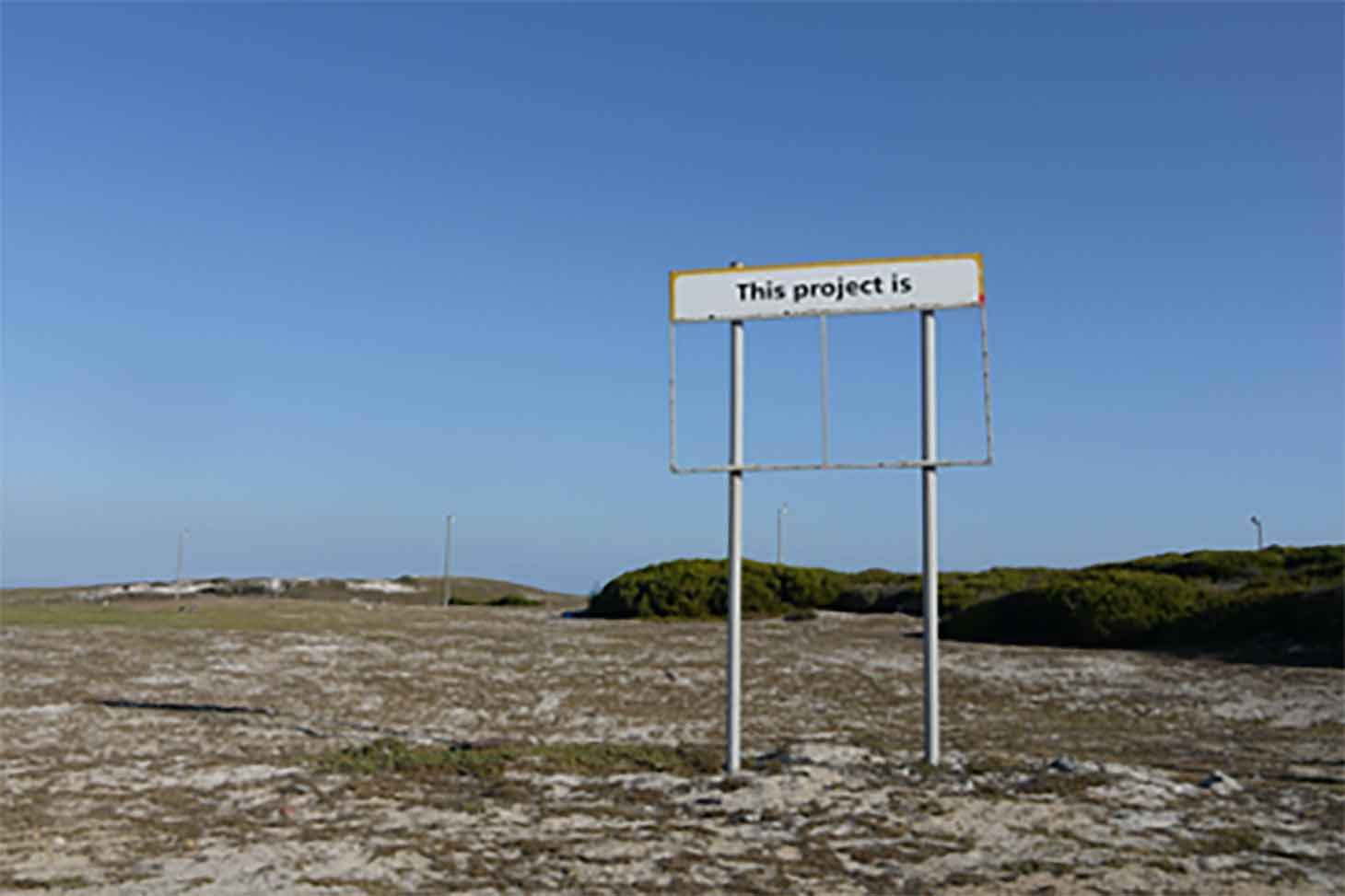 Panneau avec un écrit "The project is"